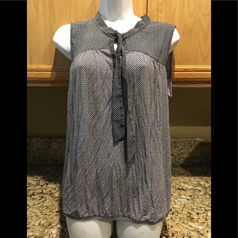 Navy and white sleeveless blouse